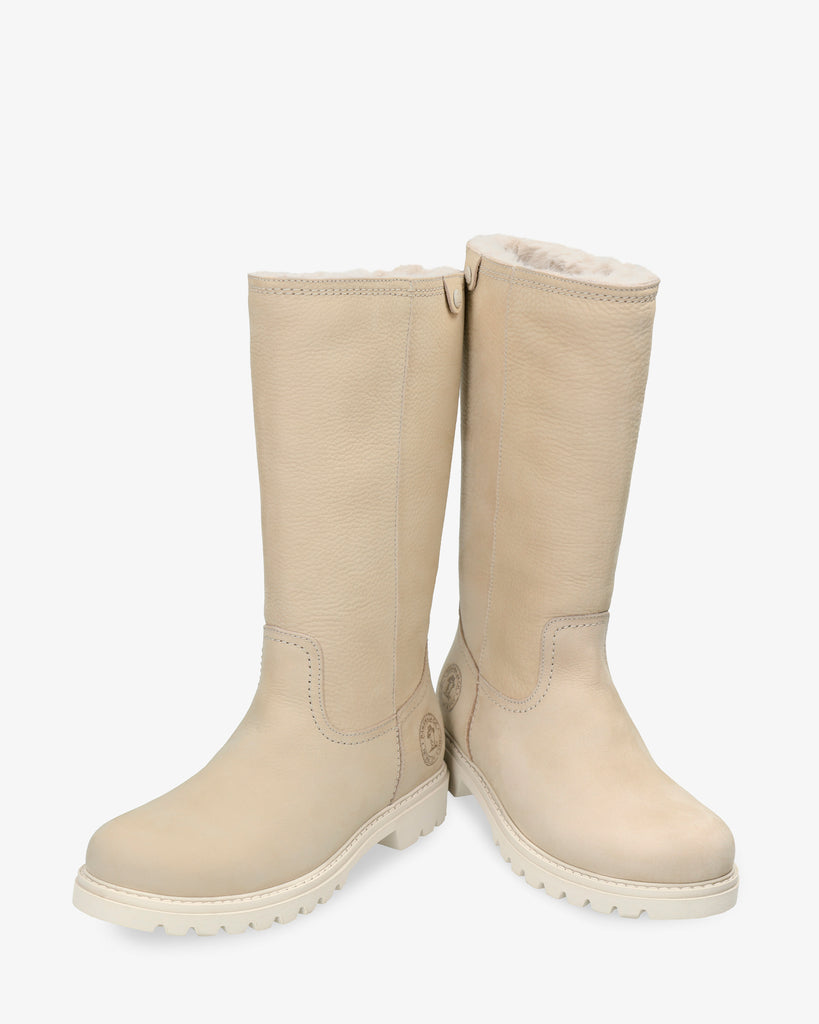 Bambina botas de piel con forro interior de pelo. crudo