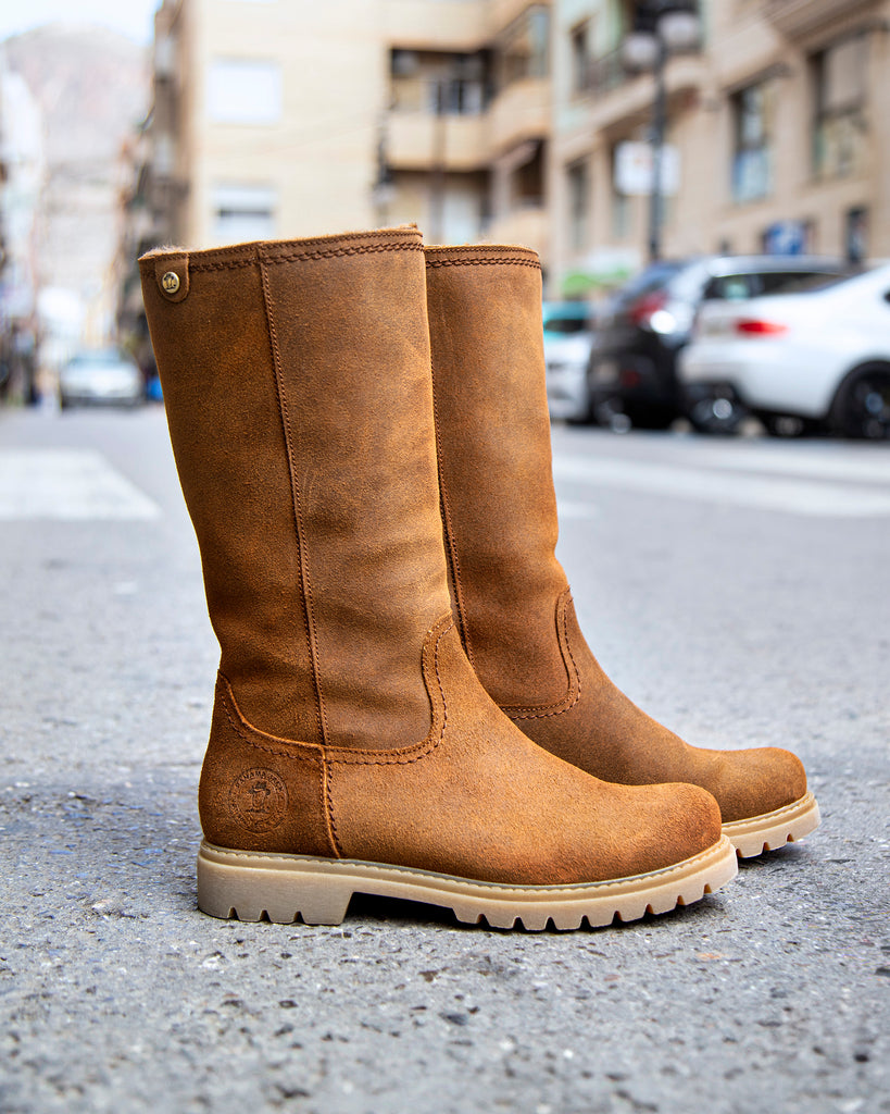 Bambina botas de piel con forro interior de pelo. cuero