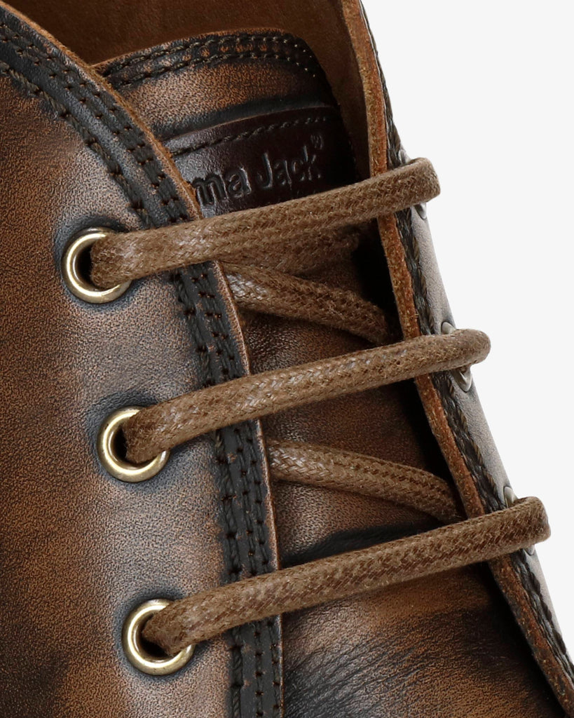 Erick botín de piel con forro interior de piel. cuero