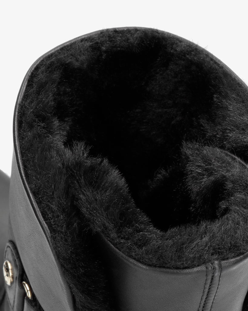 Felia Trav botas de piel con forro interior de pelo. negro