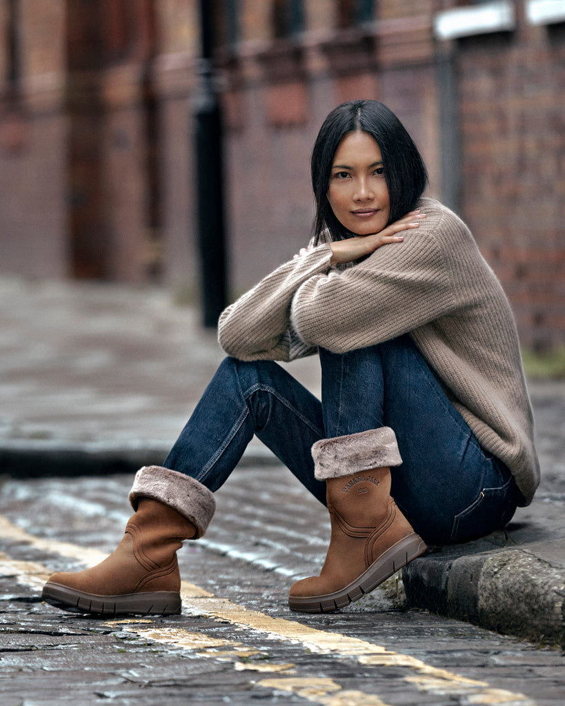 Neck botas de piel con forro interior de pelo. cuero