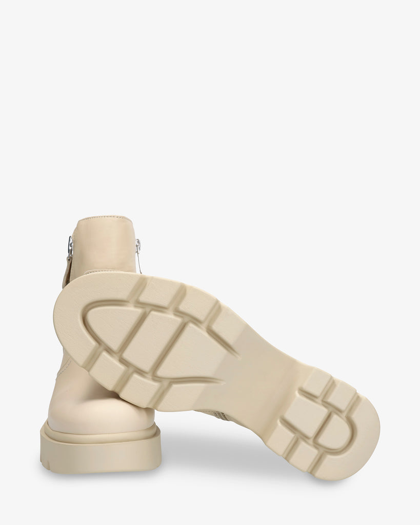 Phuket botín de piel con forro interior de pelo. crudo